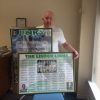 tam craven holding posters of jinky and the lisbon lions